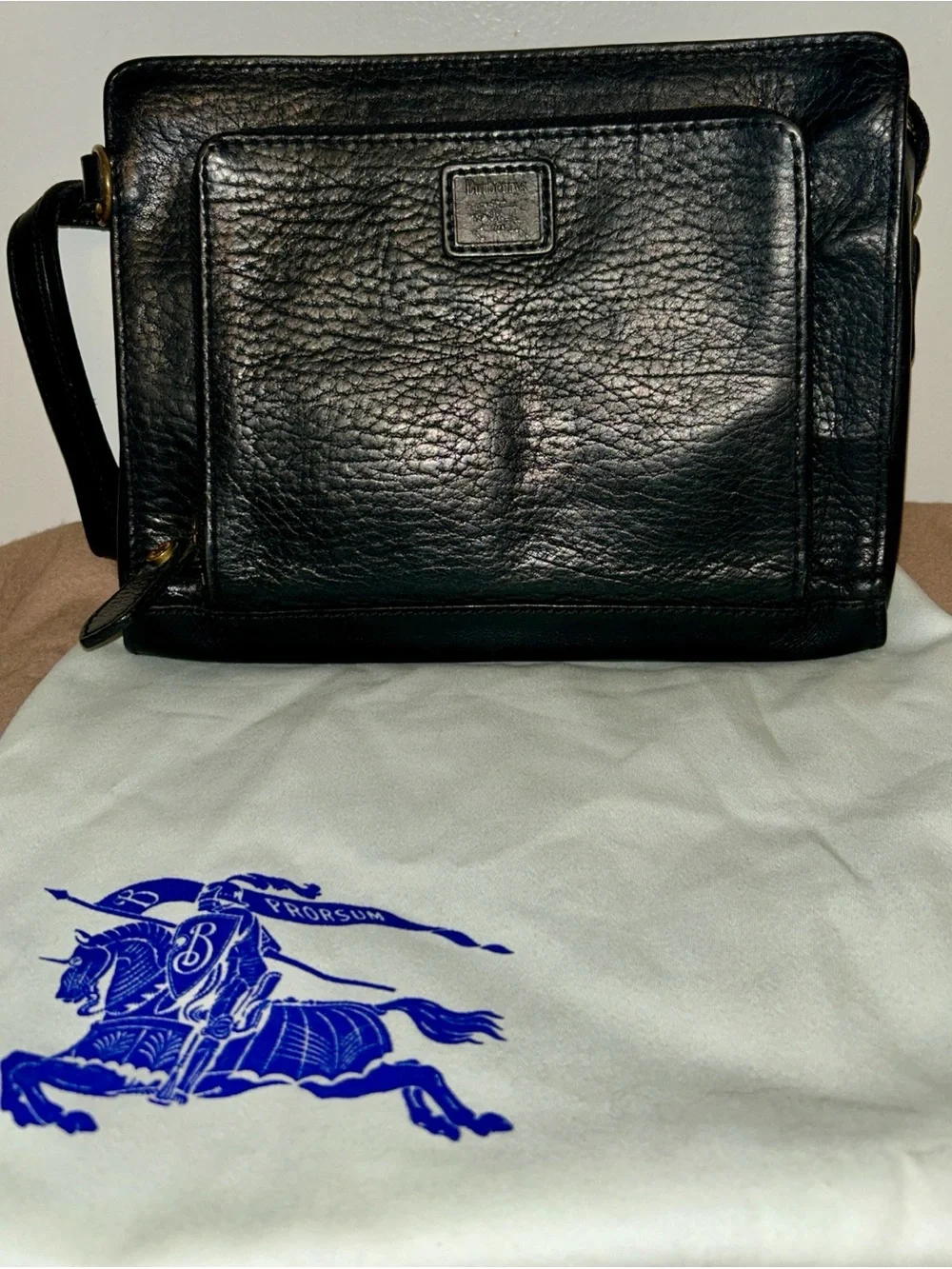 Burberrys pebbled leather crossbody / clutch bag from the pre-1999 era
